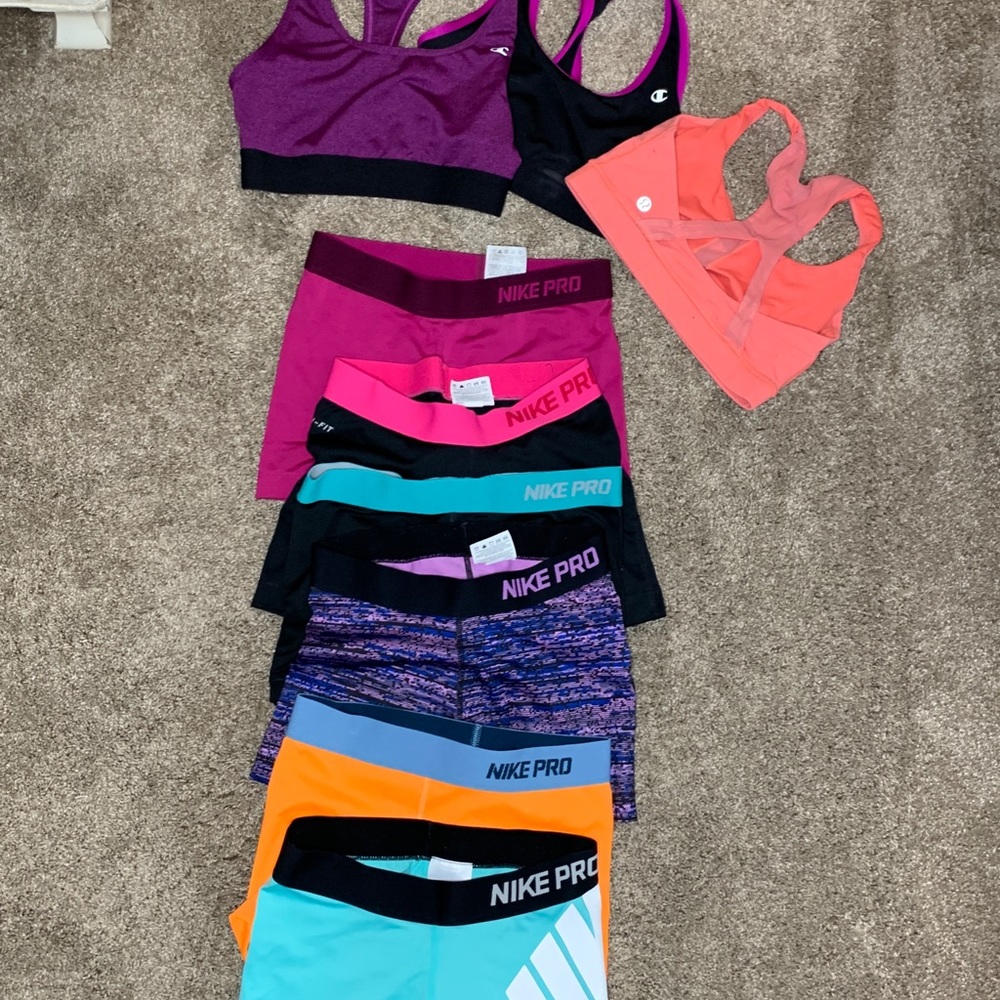 6 Nike pro short and 3 bra tops